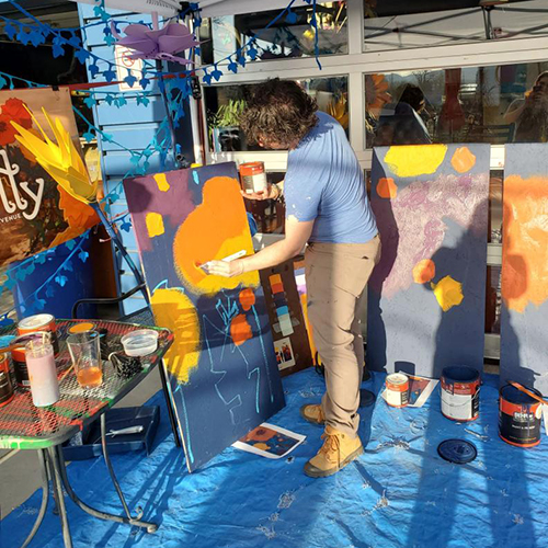 Jake painting at The Lyric
